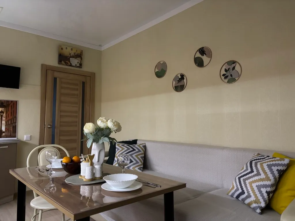 Уютная квартира - сочетание домашнего тепла и отельного сервиса