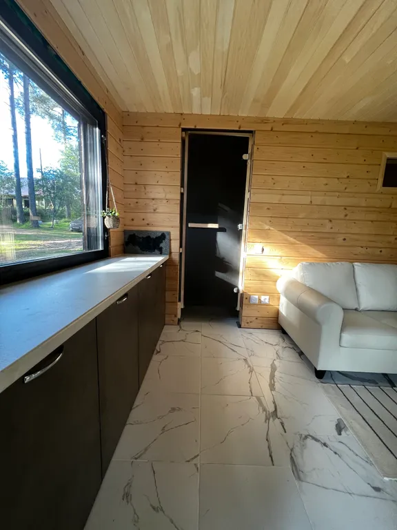 Стильный дом на берегу Ладожского озера с панорамным видом