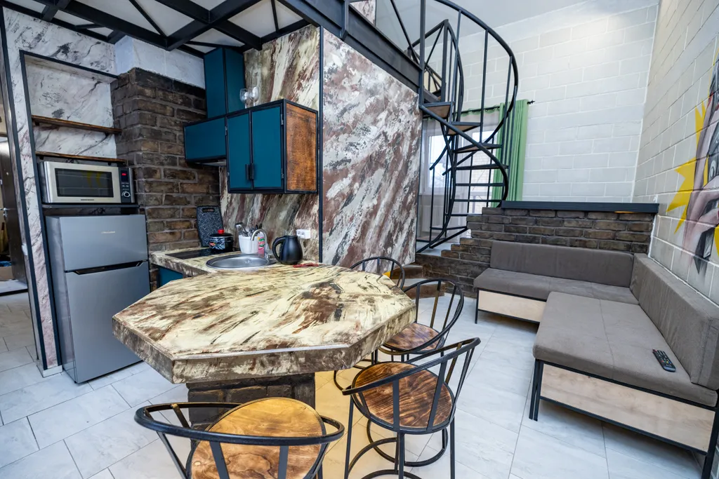 Двухуpовнeвaя cтудия с сауной Mерлин Монрo