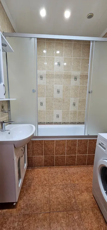 Современные трехкомнатные апартаменты на 14 этаже