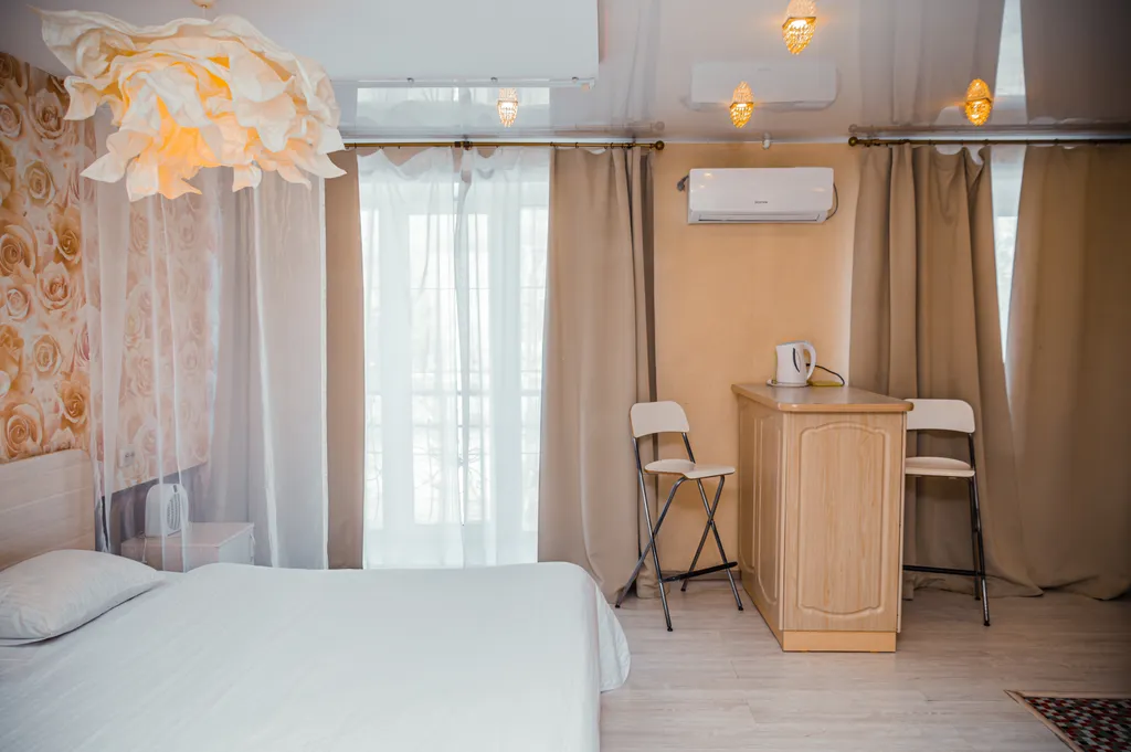 Люкс с огромной кроватью, джакузи и камином