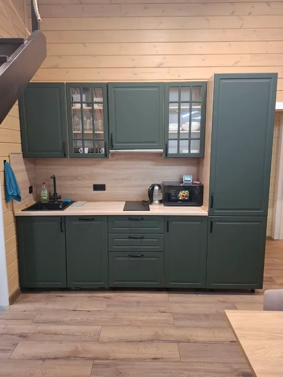 Дом с мансардой в соснах