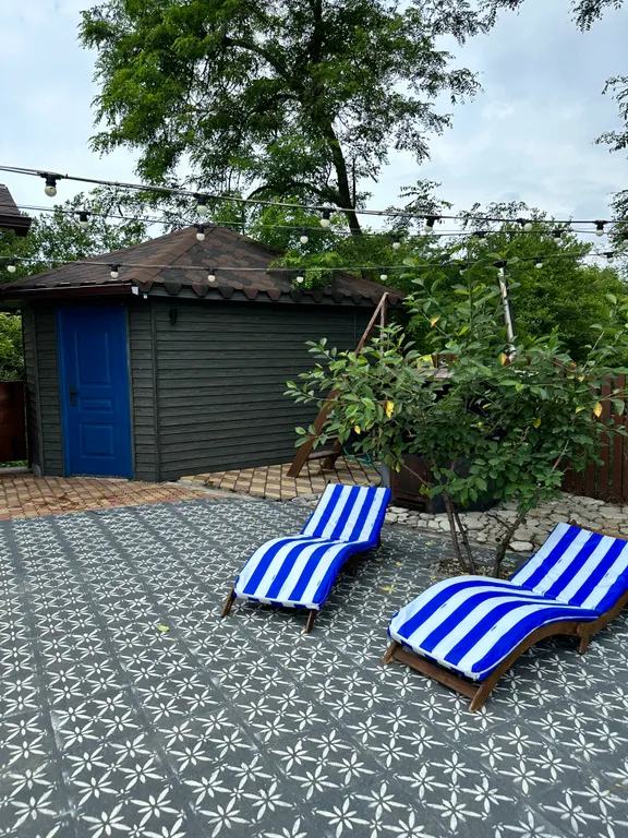 Загородный дом с бассейном и сауной