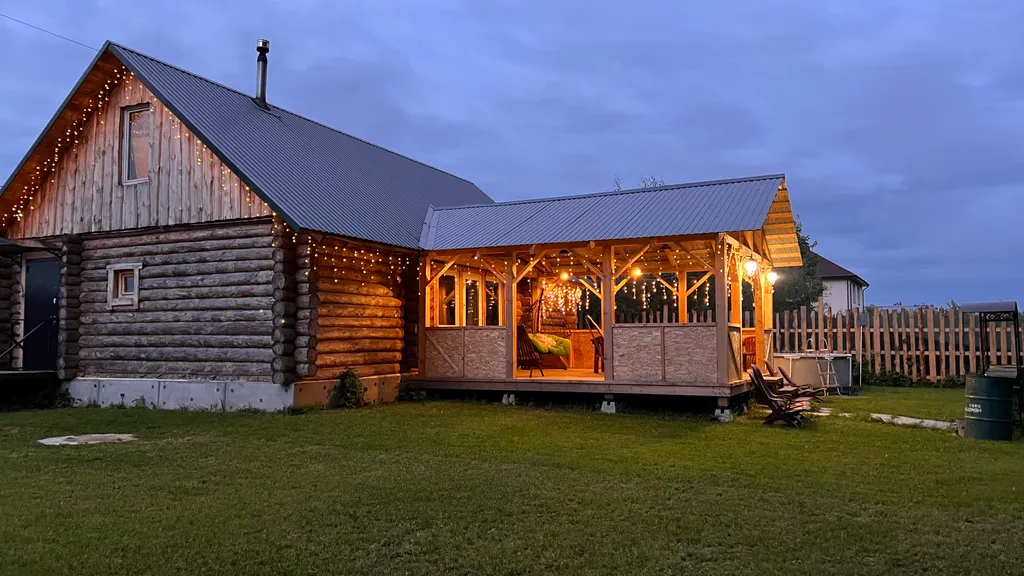 Рубленный дом - баня с террасой