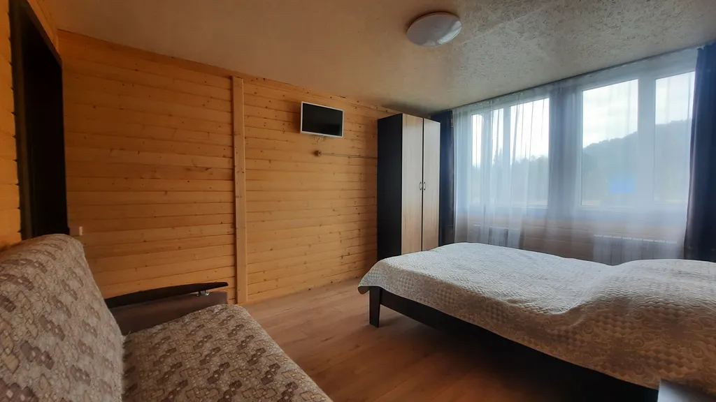 Уютный номер с видом на обзорную гору Тилан-Туу