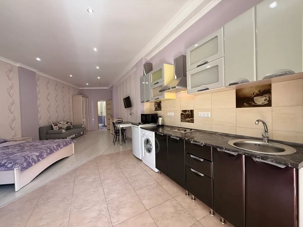 Квартира у пляжа с балконом и зоной барбекю