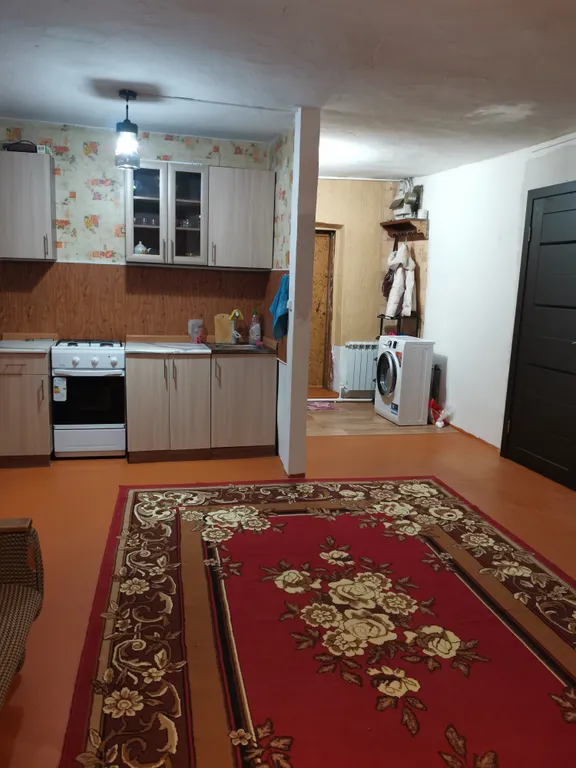 Домик в предгорье горы "50 лет"