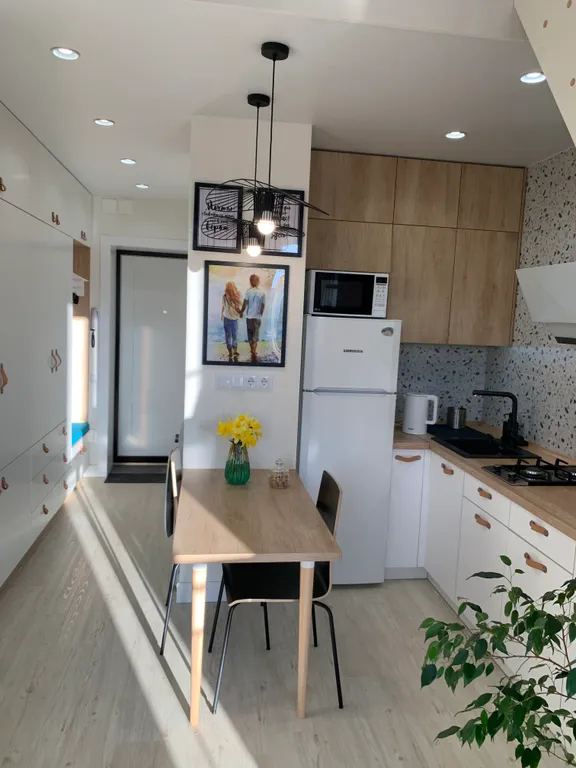 Двухуровневые апартаменты Снегурочка на набережной в центре города