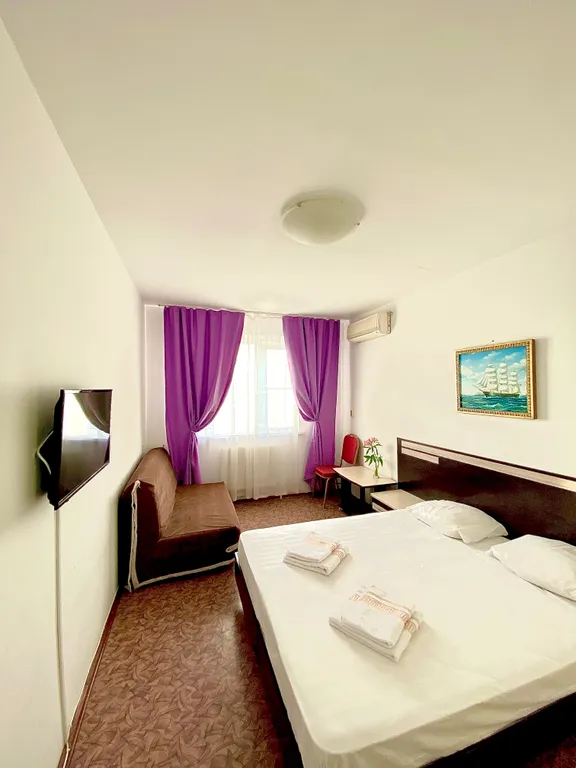 Четырехместный номер Стандарт