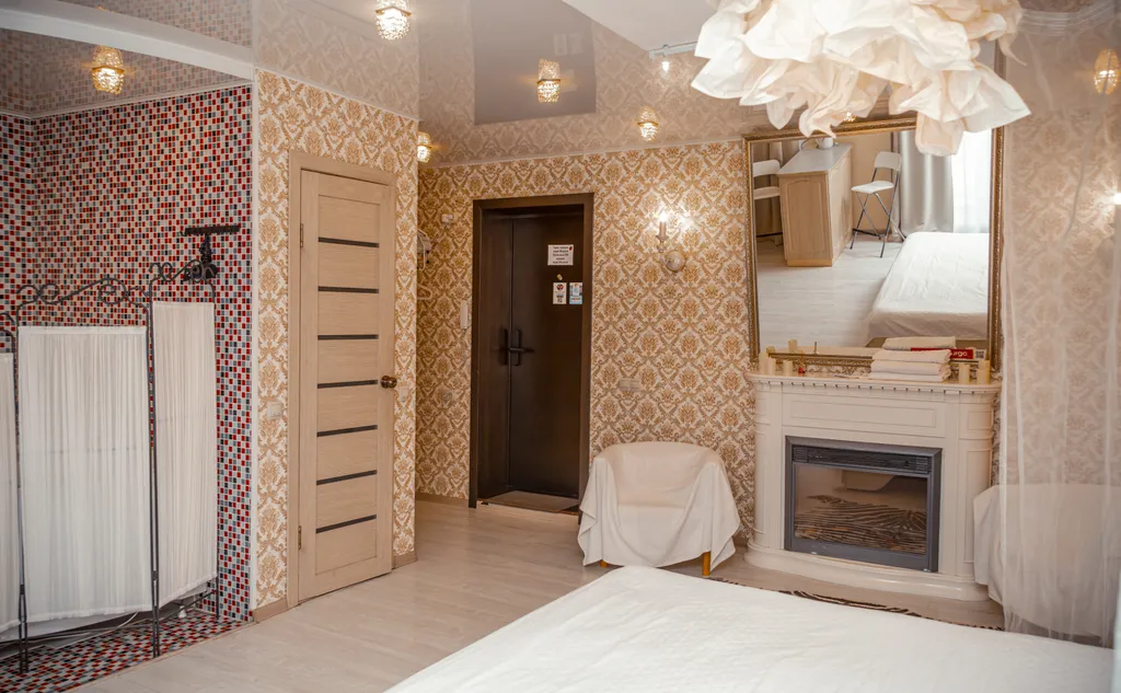 Люкс с огромной кроватью, джакузи и камином