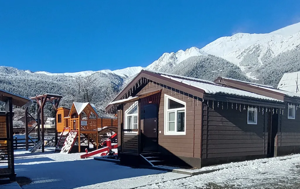 Коттедж Трёхкомнатные апартаменты с видом на горы — Архыз