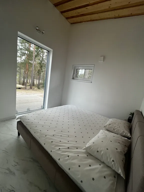 Стильный дом на берегу Ладожского озера с панорамным видом