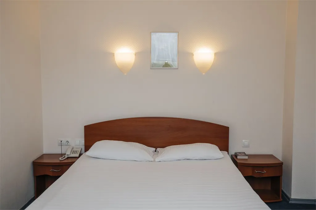 Стандартный номер с двуспальной или двумя односпальными кроватями