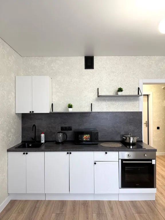 Уютная студия с новым ремонтом с видом на город