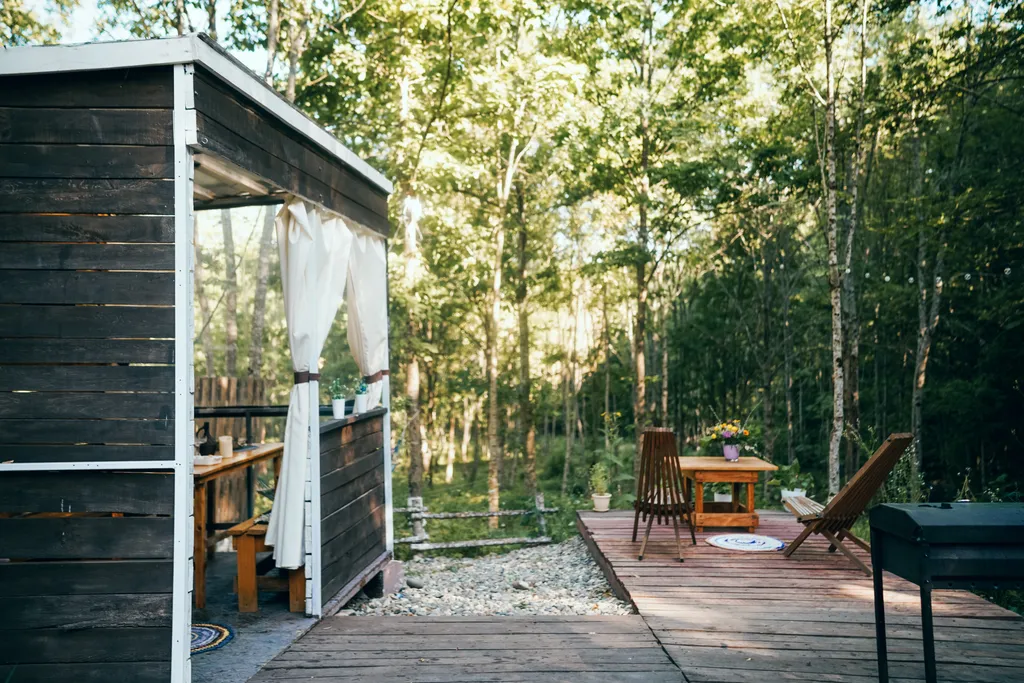 Уютный домик в лесу с террасой и беседкой