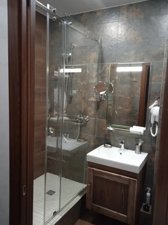 Апартамент с потрясающим видом на горы и песчаный пляж