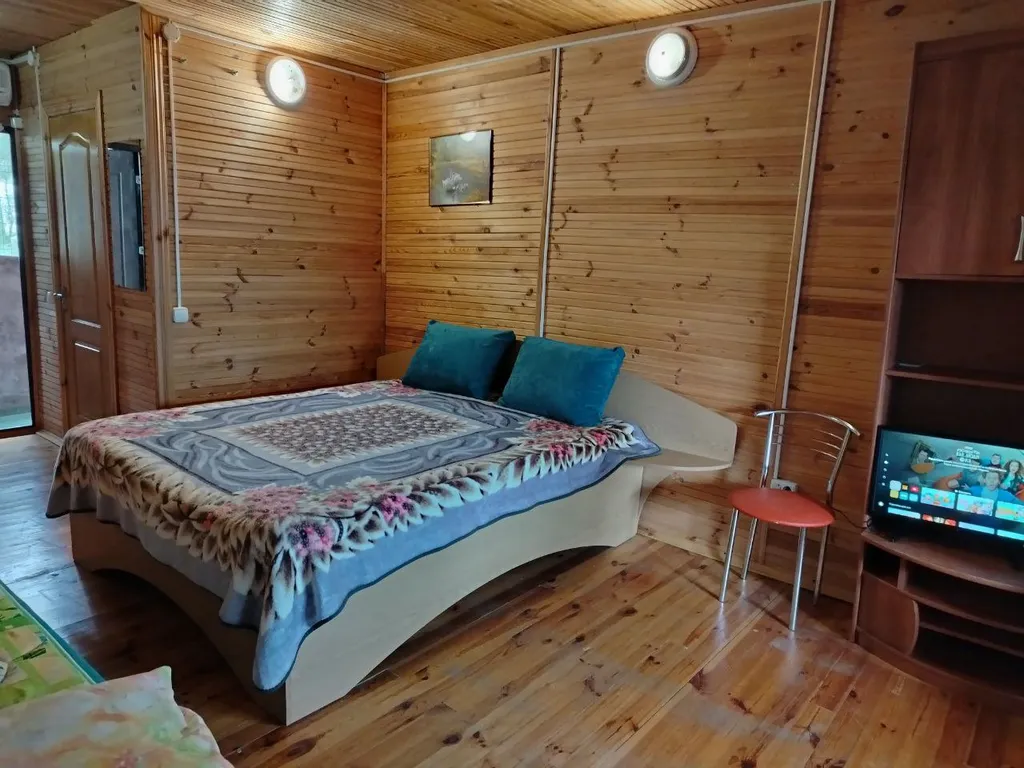 Экологичный деревянный коттедж в можжевеловой роще