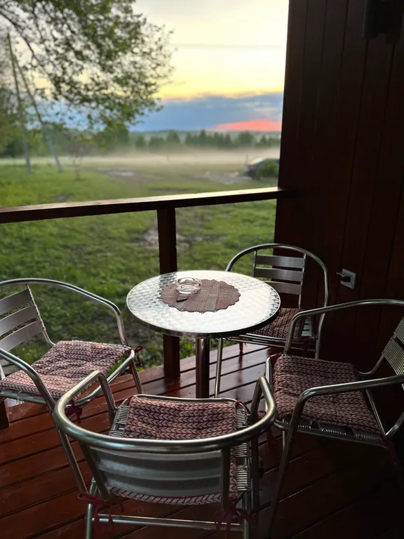 Уютный домик в древних липах