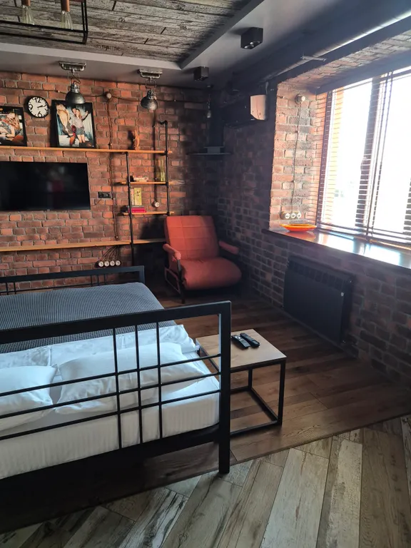 Студия лофт с видом на набережную столицы