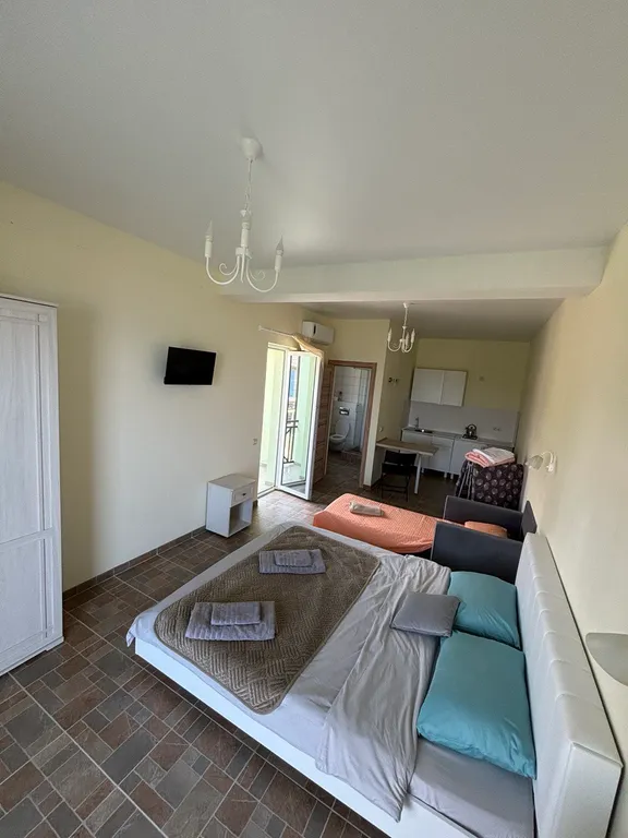 Коттедж Сдвоенные апартаменты с просторной солнечной террасой — Нижнее Учдере