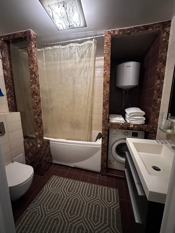 Уютная квартира с дизайнерским ремонтом в центральной части города