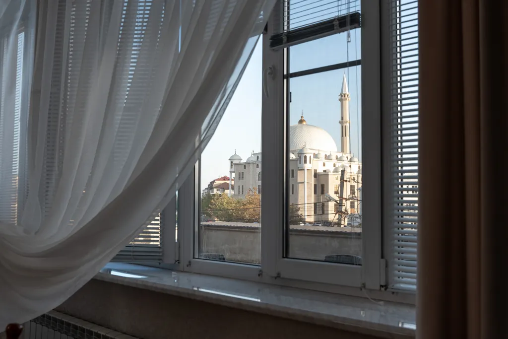 Апартаменты с видом на достопримечательность большую белую Месеть