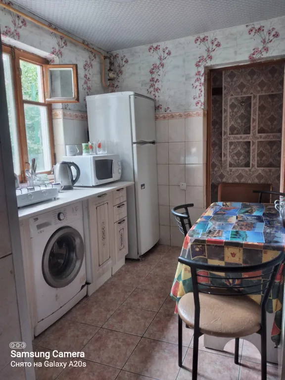 Дом у моря с площадкой в саду