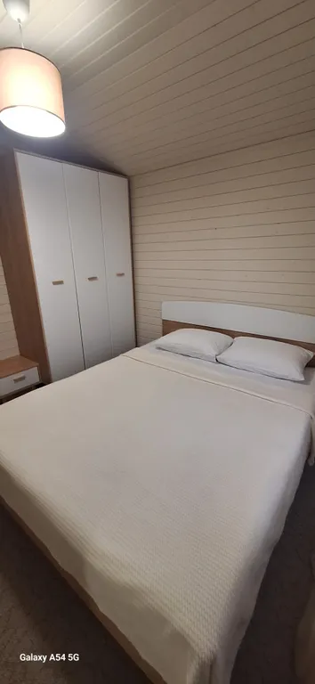 Коттедж Уютный дом у леса с двумя спальнями — Никулино