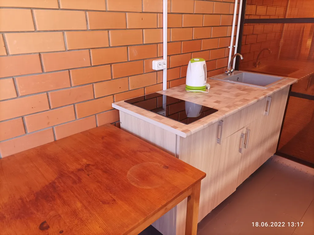 Номер с индивидуальной кухней и своим двором