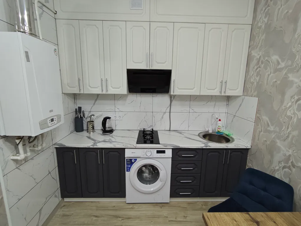 Новая дизайнерская 1-комнатная квартира в центре