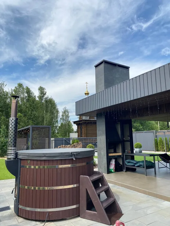 Стильный дом с чаном и сауной