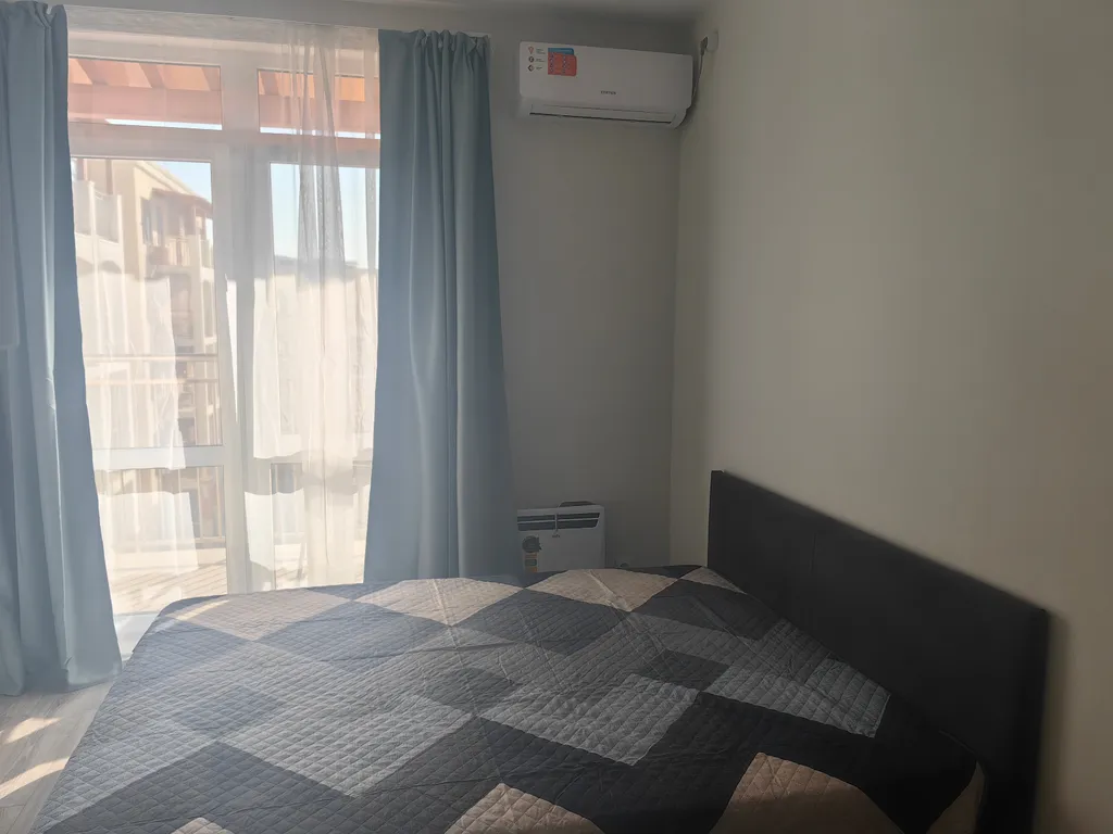 Уютная студия с видом на бассейны