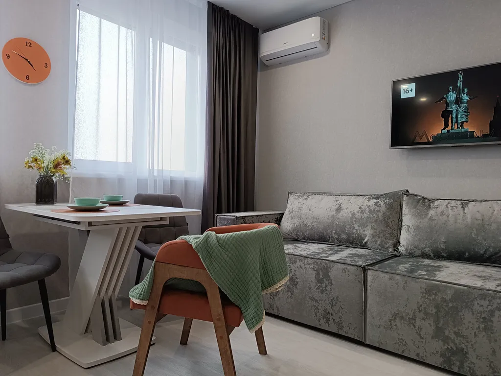 Просторная студия с 4-х местным размещением с видом на город