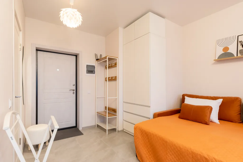 Студия Горизонты Нижнего Оранжево-изумрудный