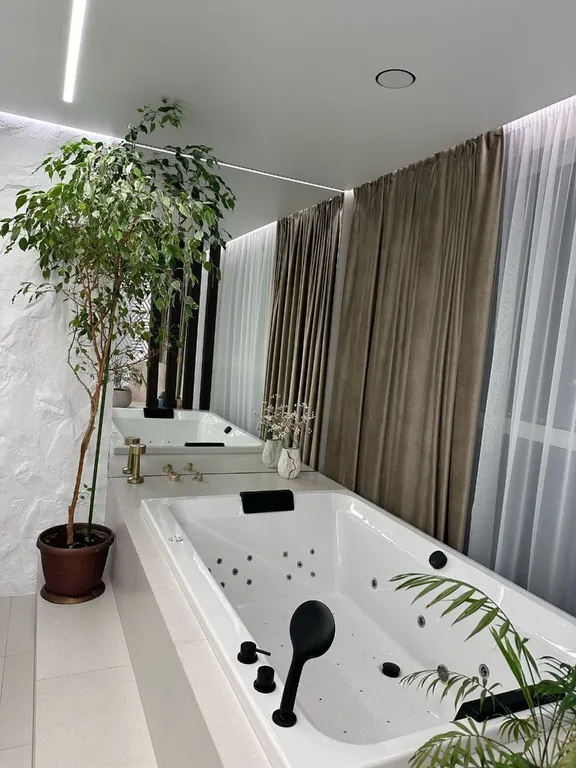 Уютный апартамент с дизайнерским ремонтом и джакузи