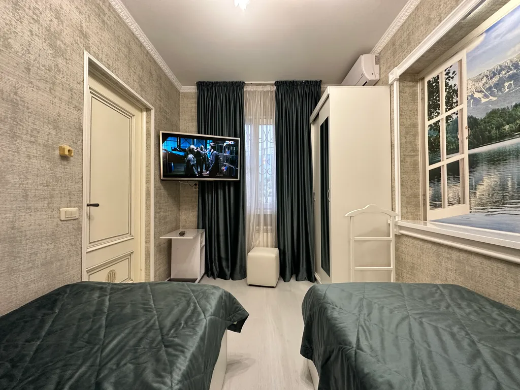 Уютная комната в центре, море - 600 метров