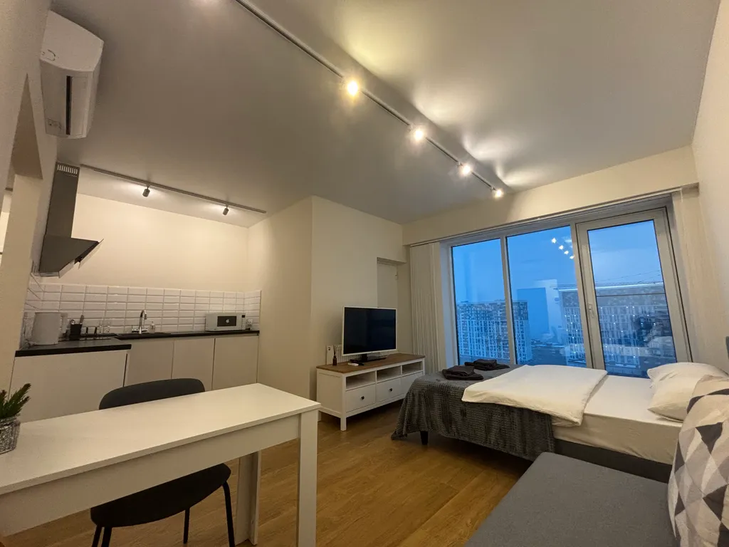 Уютная квартира с панорамными окнами