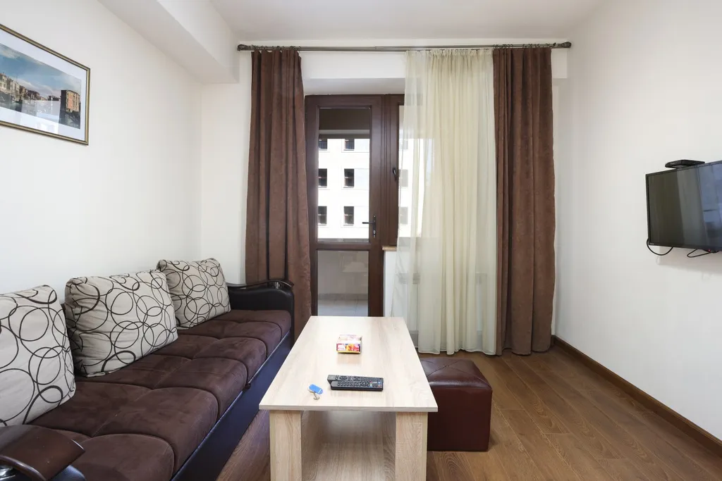 Квартира с 1 спальней и балконом в центре города