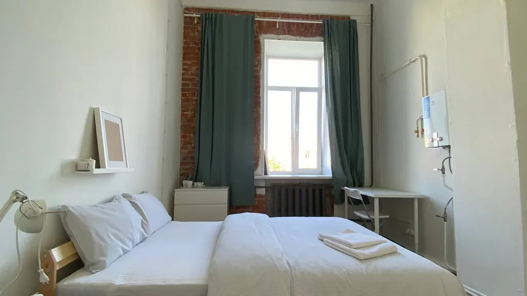 Комната с высокими потолками в самом центре Москвы