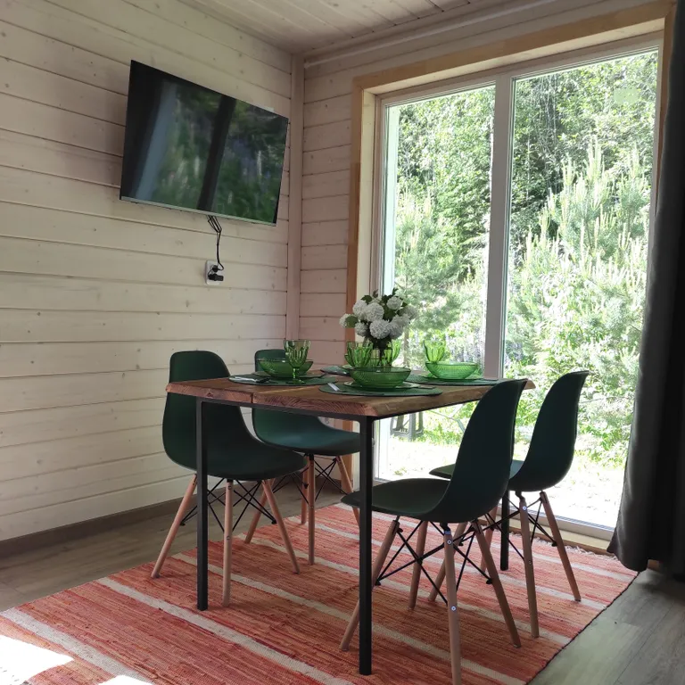 Экодомик из рубленого бревна с дровяной сауной