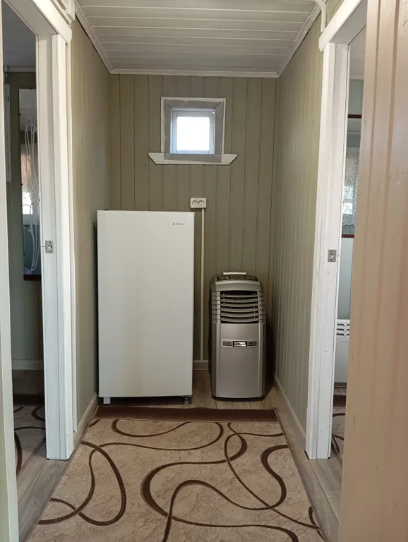 Домик с видом на затопленную колокольню