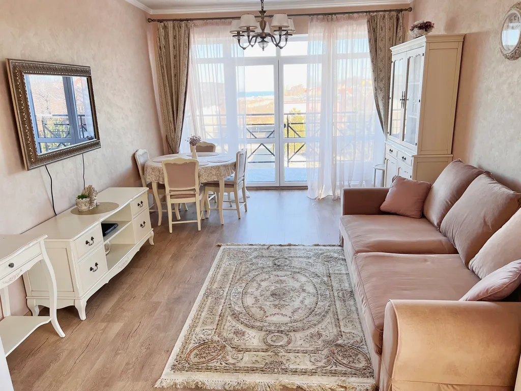 Апартаменты на первой береговой линии с боковым видом на море