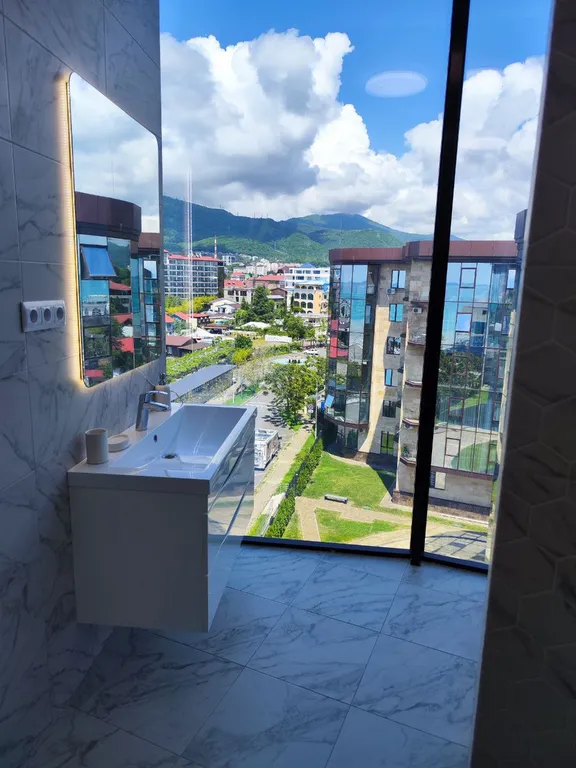 Современные апартаменты с панорамными окнами