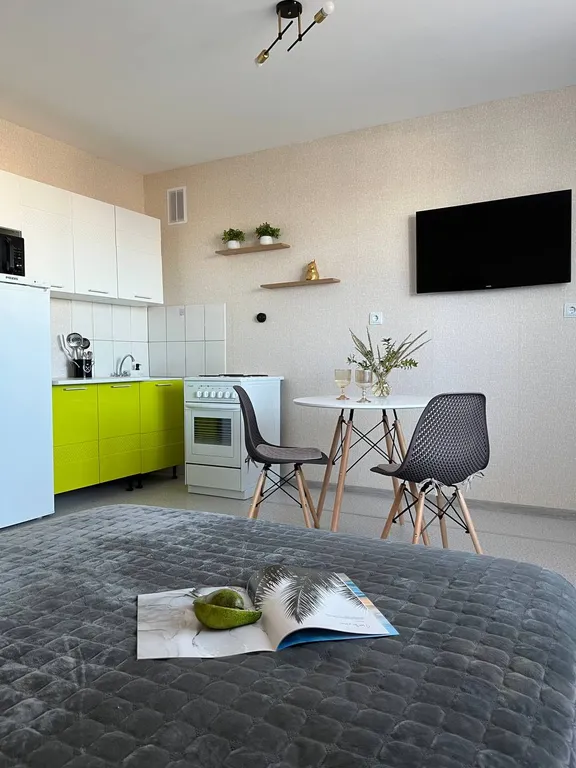 Уютная студия с видом на город