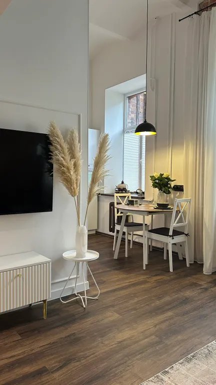 Эксклюзивная двухуровневая 1-комн. квартира с дизайнерским ремонтом