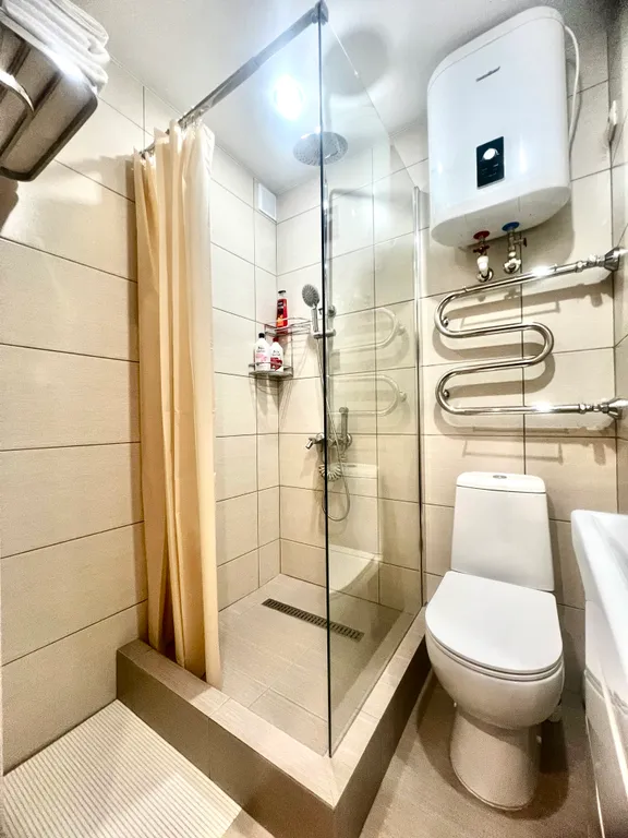 Шикарные апартаменты с белоснежными полотенцами и бельем