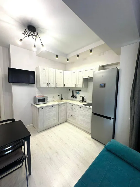 Уютная квартира с отдельной спальней в олимпийском парке