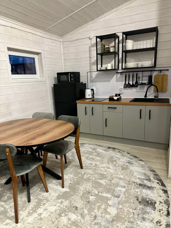 Коттедж Коттедж Уютный барнхаус с большими панорамными окнами — Архыз