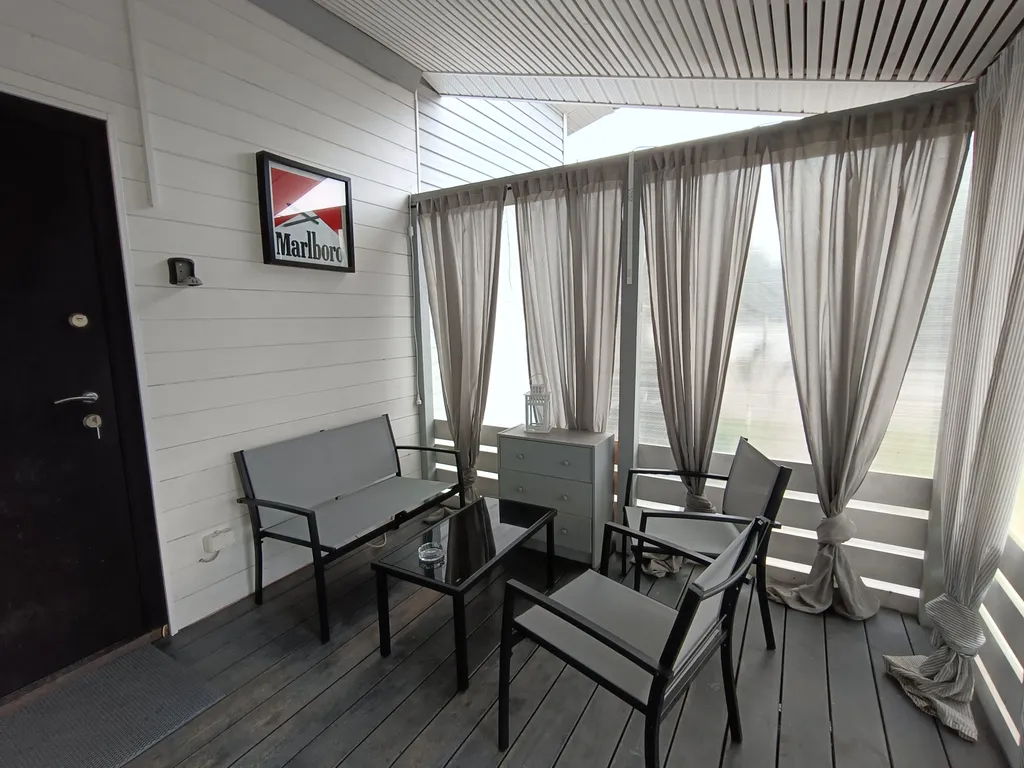 Мини коттедж с сауной и крытой террасой