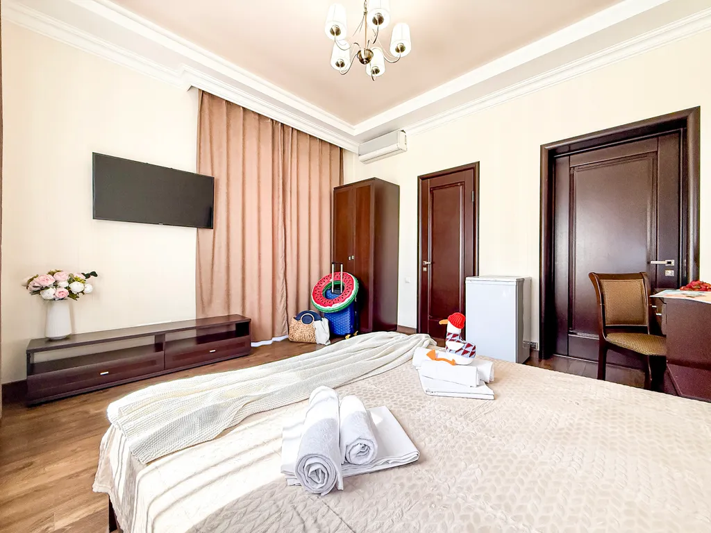 Квартира Квартира Двухместный делюкс с балконом в 3 минутах до моря, в центре с парковкой — Геленджик